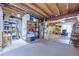 Spacious finished basement with open ceiling, storage and potential for recreation space at 7900 E Iowa Ave, Denver, CO 80231