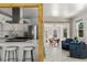 Open floor plan showcasing the kitchen, living room and eat-in kitchen design at 46 S Perry St, Denver, CO 80219