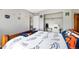 Bedroom with modern desk, comfortable chair and closet at 1444 S Richfield Way, Aurora, CO 80017