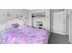 Bright bedroom featuring princess decor and a cozy bed, perfect for a sanctuary at 1444 S Richfield Way, Aurora, CO 80017