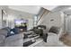 Inviting living room with vaulted ceiling, fireplace, and comfortable gray seating at 1444 S Richfield Way, Aurora, CO 80017