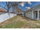 Large backyard with grass and fencing, perfect for outdoor activities and privacy at 6660 Locust St, Commerce City, CO 80022