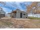 Backyard view showcases patio area, exterior and fence at 6660 Locust St, Commerce City, CO 80022
