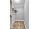 Walk-in closet with carpet floors, painted walls and shelves for easy storage at 6660 Locust St, Commerce City, CO 80022