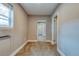 Hallway leading to other rooms in the house, offering a glimpse of the home's layout at 6660 Locust St, Commerce City, CO 80022