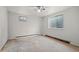 Basement featuring bare floors and a partially visible window at 7350 Field St, Arvada, CO 80005