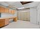 Basement featuring storage and workbench area with ample shelving and cabinets at 7350 Field St, Arvada, CO 80005