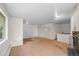 Spacious living room with white walls, large windows, and plenty of space for customization at 7350 Field St, Arvada, CO 80005