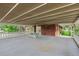Large, covered patio with railing and outdoor bench, providing a relaxing outdoor living space at 7350 Field St, Arvada, CO 80005