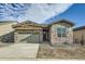 Beautiful single-story home featuring stone accents, a two-car garage, and manicured landscaping at 2978 Newfound Lake Rd, Berthoud, CO 80513