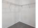 A walk-in closet features wire shelving and neutral carpeting at 1264 Penner Dr, Erie, CO 80026