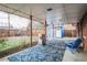 Covered patio with flagstone flooring and built-in grill at 8089 Greenwood Blvd, Denver, CO 80221