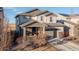 Charming two-story home with manicured lawn and inviting curb appeal at 26361 E 5Th Pl, Aurora, CO 80018