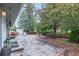 Beautiful outdoor living space with a stone patio and lovely greenery at 881 S Pearl St, Elizabeth, CO 80107