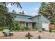 Charming single-Gathering home with a stone exterior, attached garage, and well-maintained front yard at 881 S Pearl St, Elizabeth, CO 80107