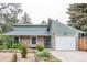 Charming single-Gathering home with a stone exterior, attached garage, and well-maintained front yard at 881 S Pearl St, Elizabeth, CO 80107