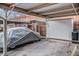 Carport featuring covered parking spot and exterior storage, adjacent to fenced yard at 12661 W Alameda Dr, Lakewood, CO 80228