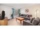 Cozy living room with a comfy sofa and an accent chair at 12661 W Alameda Dr, Lakewood, CO 80228