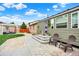 Home's backyard showcasing patio seating at 915 S Mckinley Ave, Fort Lupton, CO 80621