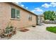 Backyard featuring a brick exterior and a concrete patio at 915 S Mckinley Ave, Fort Lupton, CO 80621