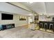 Finished basement with entertainment area, including a bar with seating at 915 S Mckinley Ave, Fort Lupton, CO 80621