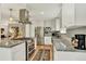 Open kitchen featuring stainless steel appliances, granite countertops, and plenty of storage at 915 S Mckinley Ave, Fort Lupton, CO 80621