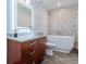 Modern bathroom with a freestanding tub, stylish vanity, and decorative mosaic tile at 1555 California St # 605, Denver, CO 80202