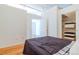 Cozy bedroom with hardwood floors and a spacious closet at 1555 California St # 605, Denver, CO 80202