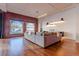 Spacious living area with exposed brick, large windows, and modern decor at 1555 California St # 605, Denver, CO 80202