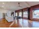 Bright, open-concept space with kitchen island, exposed brick, and city views at 1555 California St # 605, Denver, CO 80202