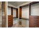 Walk-in closet with custom shelving and drawers, offering ample storage space at 7210 Otis Ct, Arvada, CO 80003