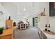 Spacious basement Gathering room with walkout access and ample room for recreation and storage at 42 Blue Sage, Littleton, CO 80127