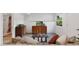 Cozy basement Gathering room with TV, decorative furniture, and comfortable seating at 42 Blue Sage, Littleton, CO 80127