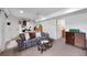 Large basement living room with open layout perfect for entertaining and relaxing at 42 Blue Sage, Littleton, CO 80127
