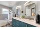 Stylish bathroom with double vanity, modern lighting, and beautiful countertops for a spa-like feel at 42 Blue Sage, Littleton, CO 80127