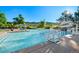 Resort-style community pool with crystal-clear water and ample seating for relaxation at 42 Blue Sage, Littleton, CO 80127