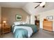 Relaxing main bedroom with vaulted ceilings and natural light at 42 Blue Sage, Littleton, CO 80127