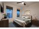 Comfortable bedroom with bed, side tables, and natural lighting at 375 Marshall Rd, Superior, CO 80027