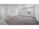 Spacious bedroom with plush carpeting, ample natural light, and a neutral color palette at 1376 Lumber Ridge N Cir, Erie, CO 80516