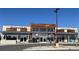 Commercial building with multiple storefronts, including Starbucks and Daddy's Chicken Shack at 420 E Fremont Pl # 203, Centennial, CO 80122