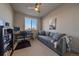 Bright office space featuring a desk, comfortable seating, and view from large window at 420 E Fremont Pl # 203, Centennial, CO 80122