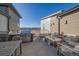 Relax on the outdoor patio with a built-in BBQ and gas fireplace for evening enjoyment at 420 E Fremont Pl # 203, Centennial, CO 80122