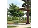 Picturesque community park featuring shaded picnic tables, walking paths and lush greenery at 420 E Fremont Pl # 203, Centennial, CO 80122