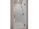 Modern, glass-enclosed shower with white subway tiles and a rainfall shower head at 420 E Fremont Pl # 203, Centennial, CO 80122