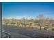 Scenic street view with mature trees and mountain views at 420 E Fremont Pl # 203, Centennial, CO 80122