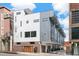 Modern multi-unit building with sleek design and attached garages at 3026 Zuni St, Denver, CO 80211