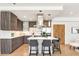 Modern kitchen with stainless steel appliances and an island at 3026 Zuni St, Denver, CO 80211