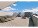 Relaxing rooftop deck featuring a hot tub and fire pit at 3026 Zuni St, Denver, CO 80211