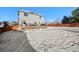 Large backyard with a deck and snow on the ground at 600 Balsa Dr, Castle Rock, CO 80104