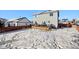 Large backyard with a deck and snow on the ground at 600 Balsa Dr, Castle Rock, CO 80104